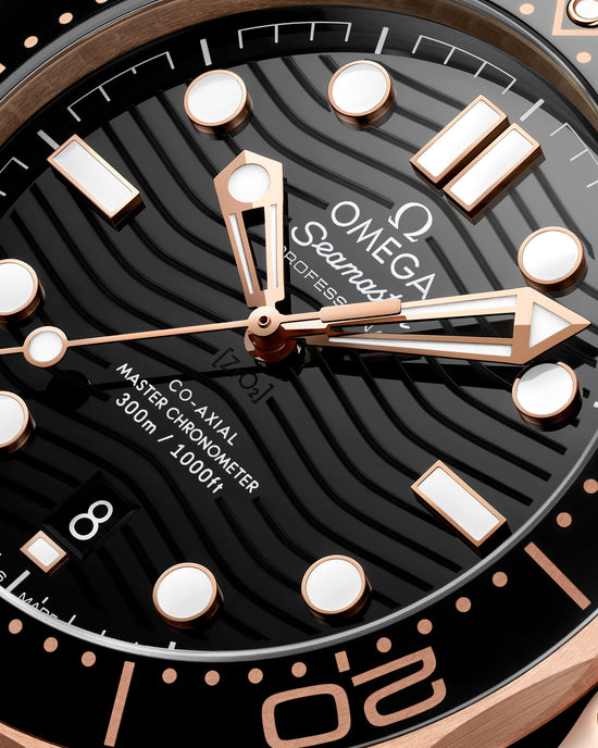 Omega Replica Watch Seamaster Diver 300m, 18k Sedna™ Gold, Ceramic, 42mm, 210.62.42.20.01.002