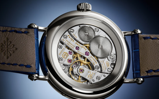 Patek Philippe Replica Watch Complication Moon Phases, 18k White Gold with 132 (~1.09 cts.) brilliant-cut diamonds, 33mm, 7121/200G-001