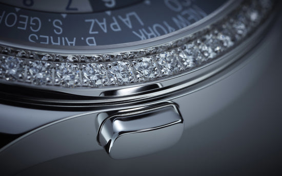 Patek Philippe Replica Watch Women’s Complication World-Time, 18k White Gold set with 89 diamonds (~1.03 ct.), 36mm, 7130G-016