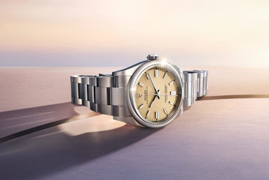 Rolex Replica Watch Oyster Perpetual, Oystersteel 36mm, Beige dial, Domed Oyster, 126000-0012